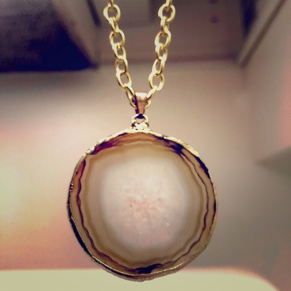 Agate Slice with Gold electromagnetic coating.